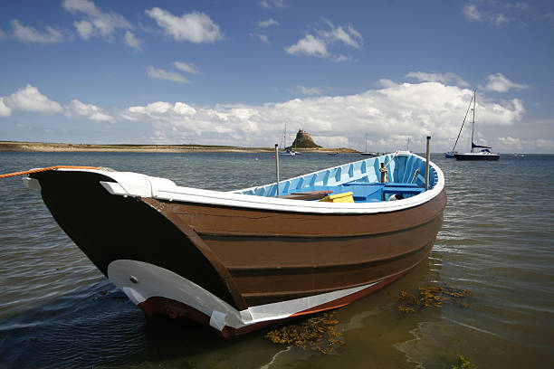 istock Holy Island Castle with floating boats 91776495