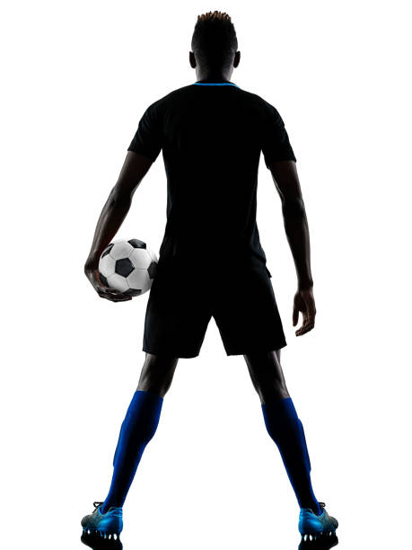 istock one african soccer player man isolated white background silhouet 917769862