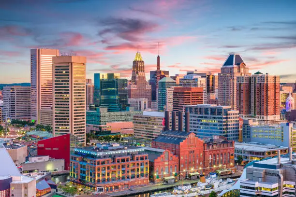 Baltimore, Maryland, USA Skyline over the Inner Harbor at dusk.