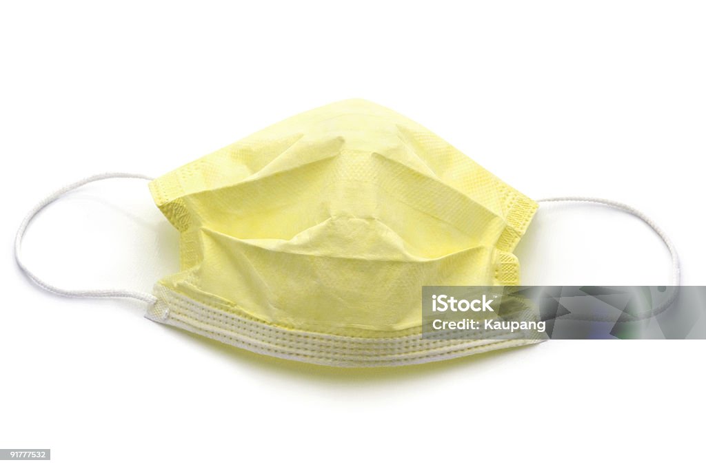 黄色外科手術用マスク - 黄色のロイヤリティフリーストックフォト