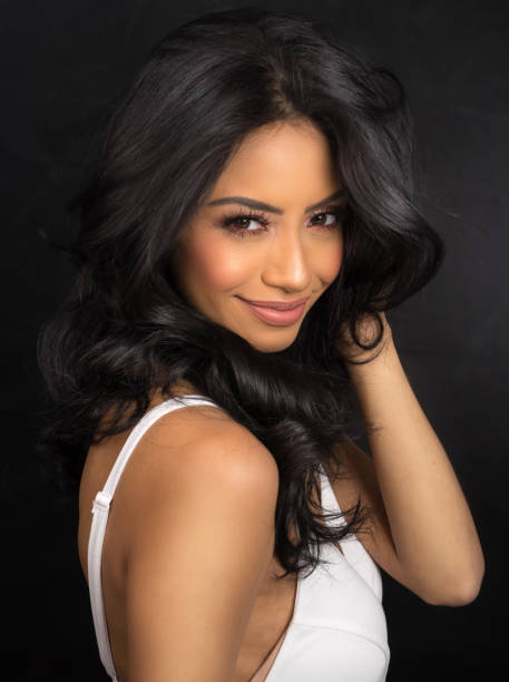 istock Beautiful woman's face with long dark hair 917777564