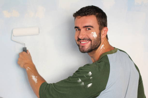 istock Handsome male about to paint a wall 917777736