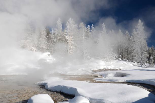 istock Chromatic Pool in the Upper Geyser Basin during Winter 917778116