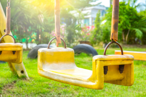 Swing on playground in park