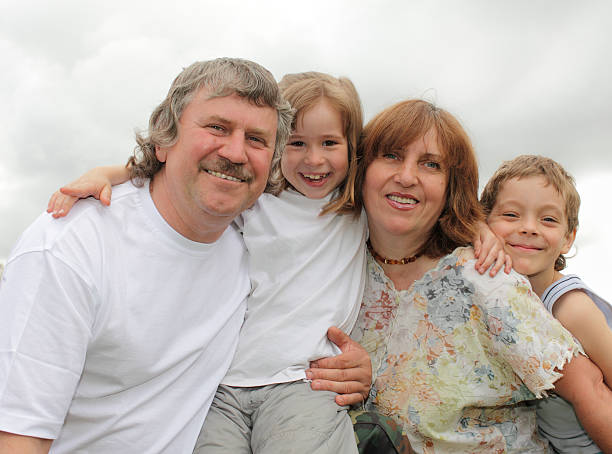 istock Grandparent and grandchild in park 91777863