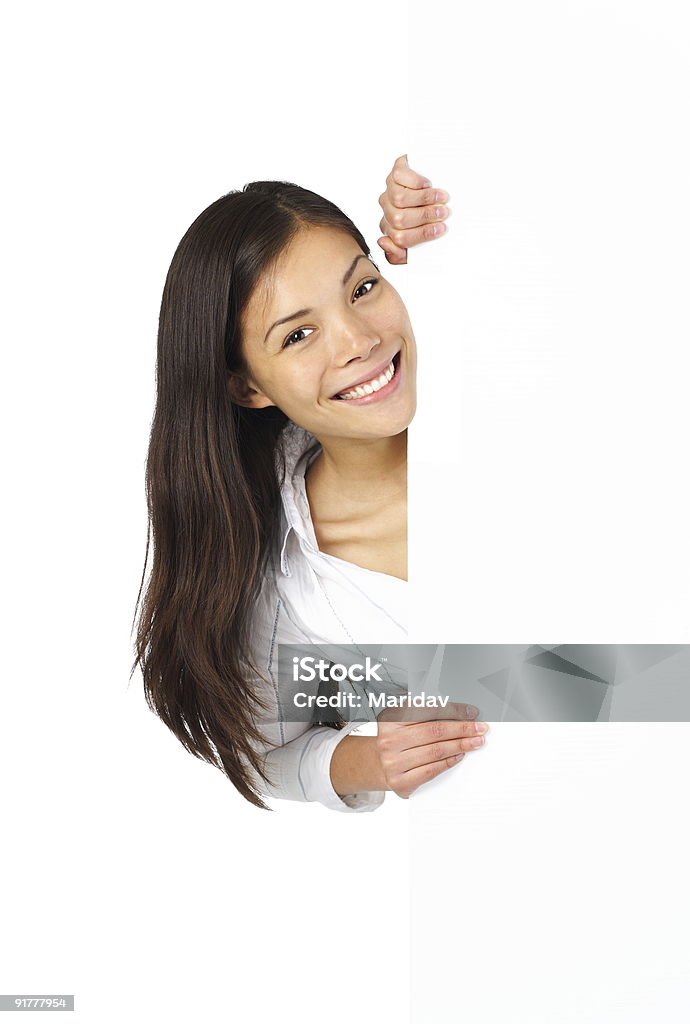 Mujer agarrando señal desde el lateral - Foto de stock de Adulto libre de derechos