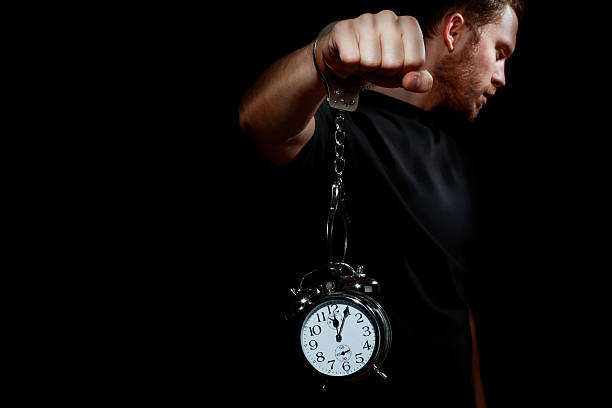 Man in handcuffs stock photo