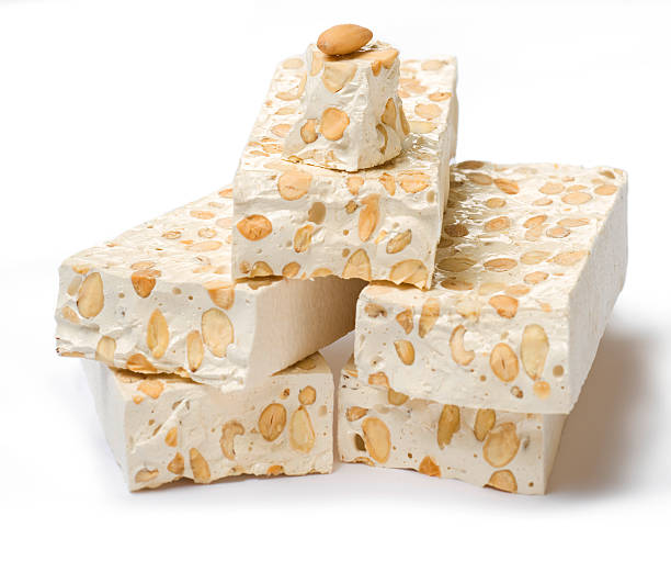 Assorted traditional Christmas nougat isolated on white background