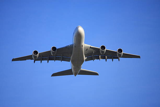 istock Airbus A380 flying low overhead 91778626