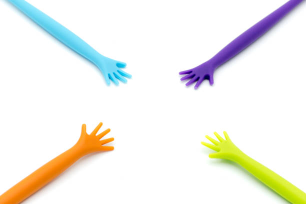 istock Colorful plastic hands raise up, voting isolated on white background, participate concept. 917795060