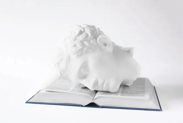 Photo of Classical Head on open Book