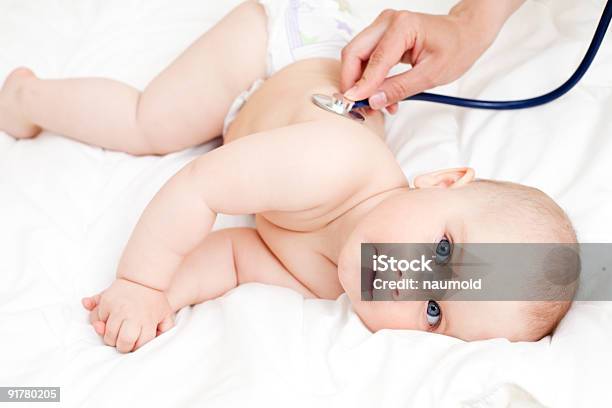 Doctor Listens To Infants Lungs Using Stethoscope Stock Photo - Download Image Now - Baby - Human Age, Baby Girls, Care