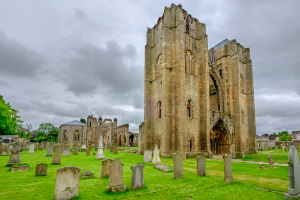 elgin cathedral, historic ruin of a medieval building begun in 1224, located in north-east scotland. - uk cathedral cemetery day imagens e fotografias de stock