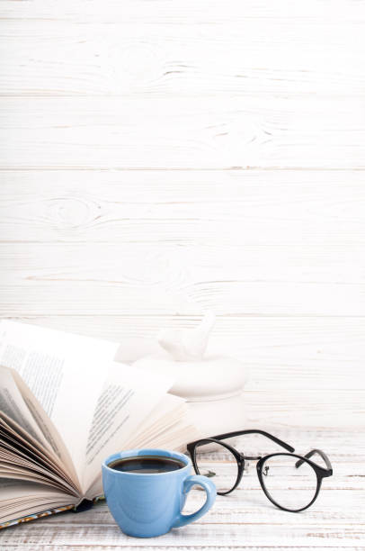 Reading Book And Drinking Coffee Copy Space Book Coffee Cup Glasses On Wooden Background Stock Photo - Download Image Now - iStock Reading Book And Drinking Coffee Copy Space Book Coffee Cup Glasses On Wooden Background Stock Photo - Download Image Now - iStock