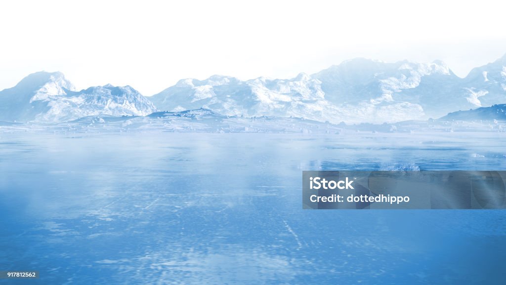 frozen lake with surrounding snow covered rocky mountains Ice Stock Photo