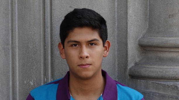 istock Serious Hispanic Teen Boy 917814674