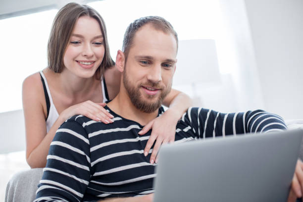 istock Loving man and woman relaxing together 917814902