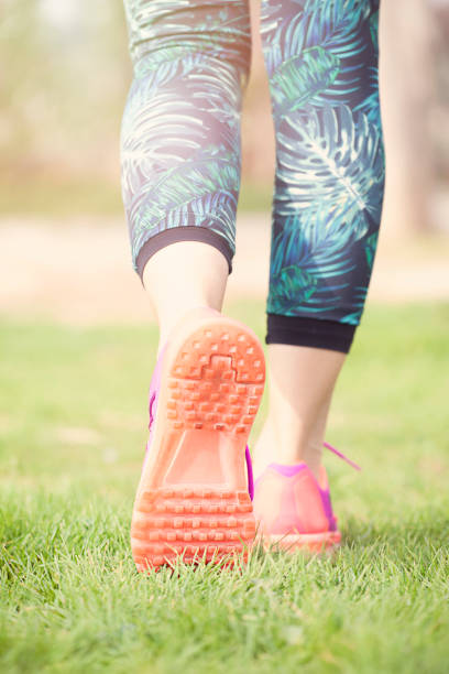istock Young woman running outdoors in morning 917820206