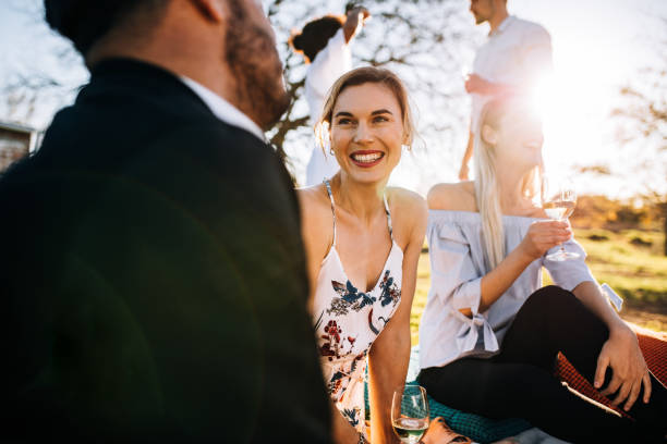 istock Group of friends hanging out at outdoors party 917820506