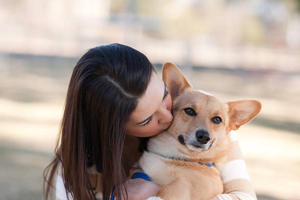 istock Beautiful young woman with a dog 91782054
