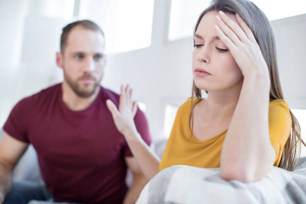 istock Unsmiling woman not wanting to talk with her man 917821266