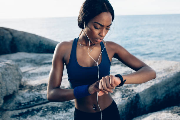 istock Runner checking fitness progress on her smartwatch 917822024