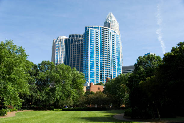 istock skyscrapersand a green lawn 91782258