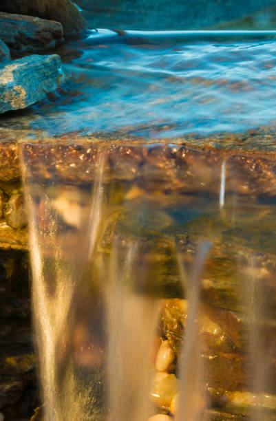 istock Water flowing over a rock lip 917833056