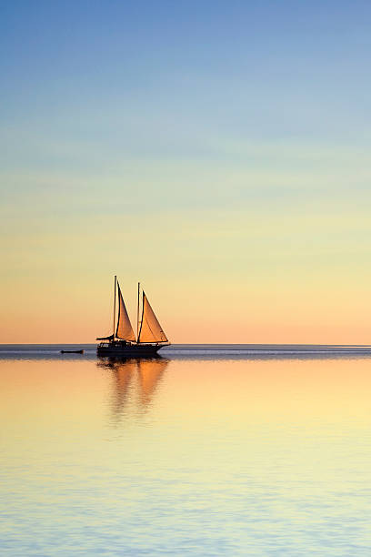istock Sailing Boat on a Tropical Ocean at Twilight 91783423