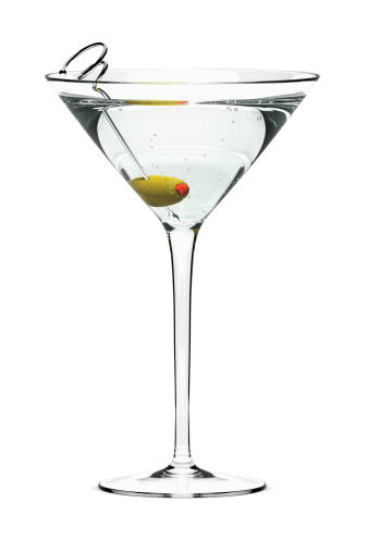 Martini with olive on fancy skewer, isolated on white. Includes pro clipping path.