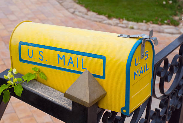 Yellow mailbox stock photo