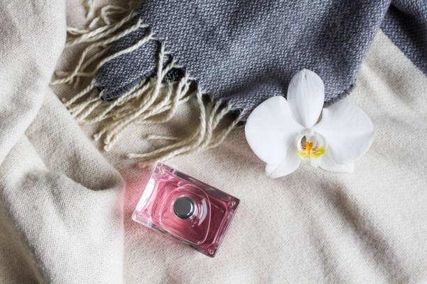 Luxury rose perfume and Orchid on beautiful scarf
