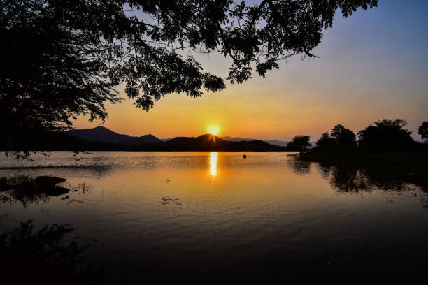 istock Landscape reservoir and mountain on sunset. 917843648