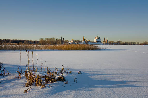 istock Winter landscape with a monastery in the distance. 91784392