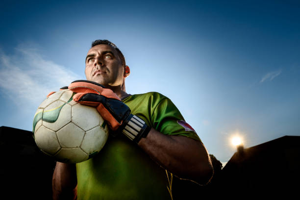 Soccer goalkeeper catches the ball