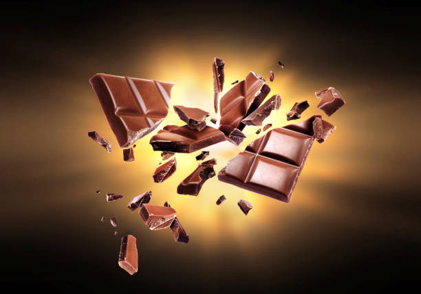 istock Chocolate broken into pieces in the dark 917853516