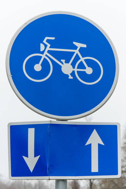 istock Bicycle lane, round blue road sign 917855010