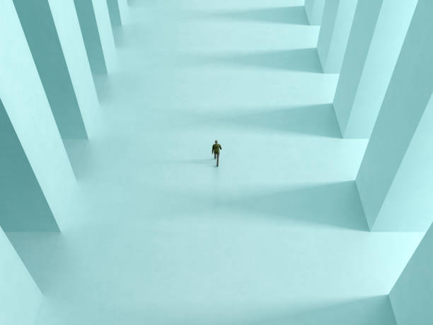 istock a lonely man walk the corridor with columns to the light 3D rendering 917862030