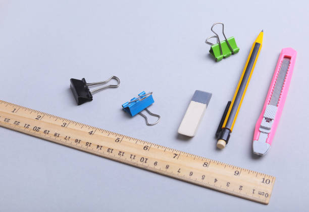 istock office supplies and gadgets on desk. Top View. 917865424
