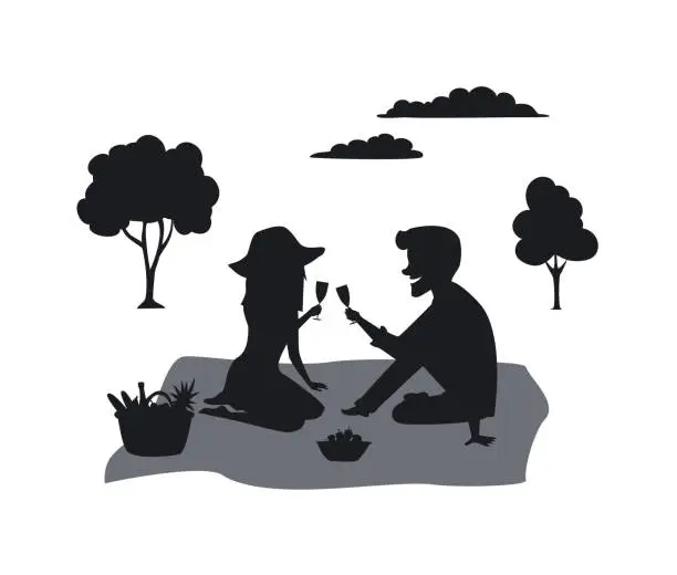 Vector illustration of silhouette of a couple on a picnic in the park