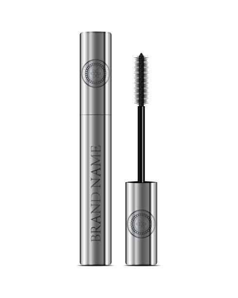 A mascara tube and a wand applicator. Cosmetic silver bottle with eyelash brush. 3d realistic vector. A mascara tube and a wand applicator. Cosmetic silver bottle with eyelash brush. Isolated on white background. Good for booklets, brochures, leaflets or banner. 3d realistic vector. mascara wands stock illustrations