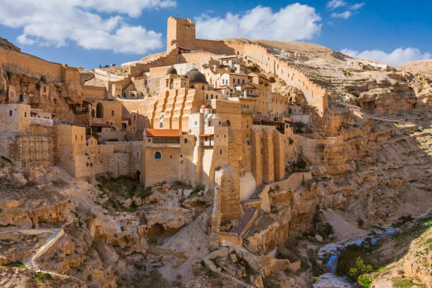 Holy Lavra of Saint Sabbas the Sanctified (Mar Saba) near Bethlehem Israel - Palestine / West Bank - Bethlehem - Holy Lavra of Saint Sabbas the Sanctified (Mar Saba) monastery on the wall of Kidron valley in Judean desert bethlehem west bank stock pictures, royalty-free photos & images