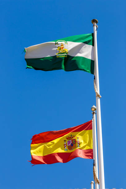 Banderas De España Y Andalucía Foto de stock y más banco de imágenes de  Bandera - Bandera, Comunidad Autónoma de Andalucía, Amarillo - Color -  iStock