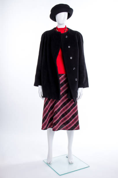 istock Black hat, coat and striped skirt. 917875194