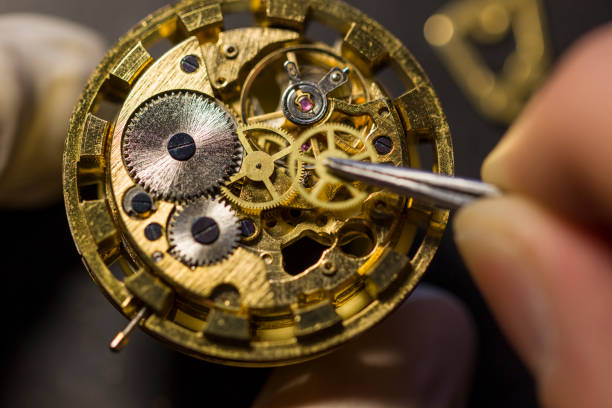 istock Watchmaker is repairing the mechanical watches in his workshop 917878626