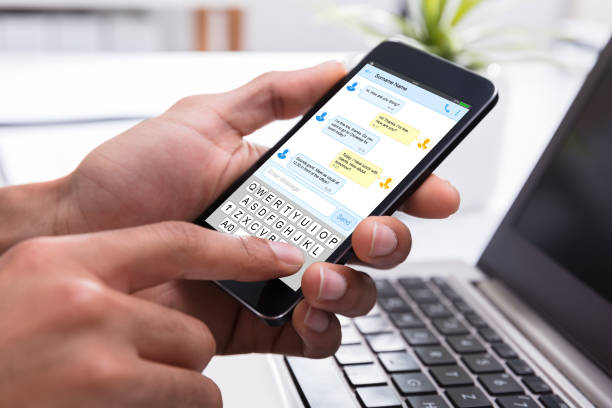 istock Businessperson Typing Text Message On Mobile Phone 917885024