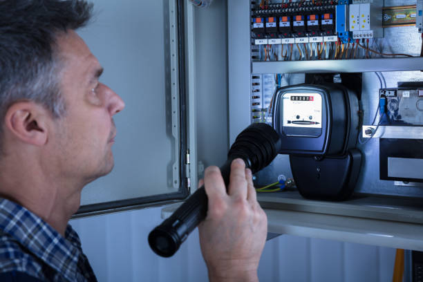 istock Electrician Examining A Fusebox 917888962