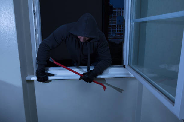 istock Burglar Entering In A Room 917889188