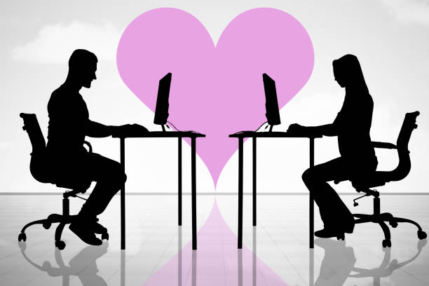 Couple In Love Using Computers Silhouette Of Couple In Love Using Computers work romance stock pictures, royalty-free photos & images