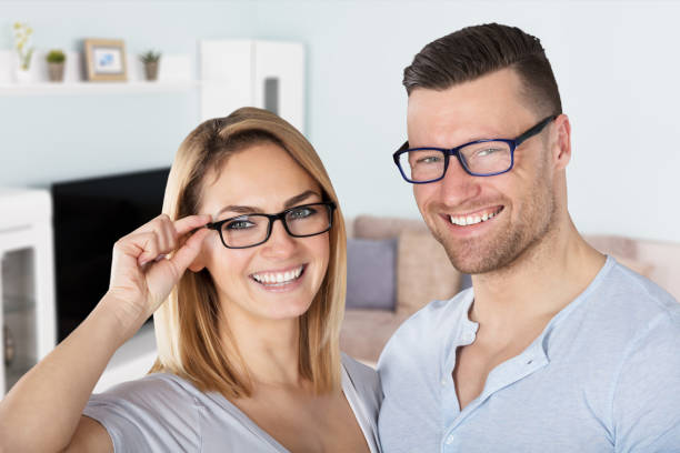 istock Smiling Couple Wearing Eyeglasses 917895846